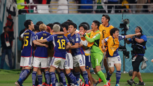 Players of Japan pictured celebrating during their 2-1 win over Germany at the 2022 FIFA World Cup in Qatar